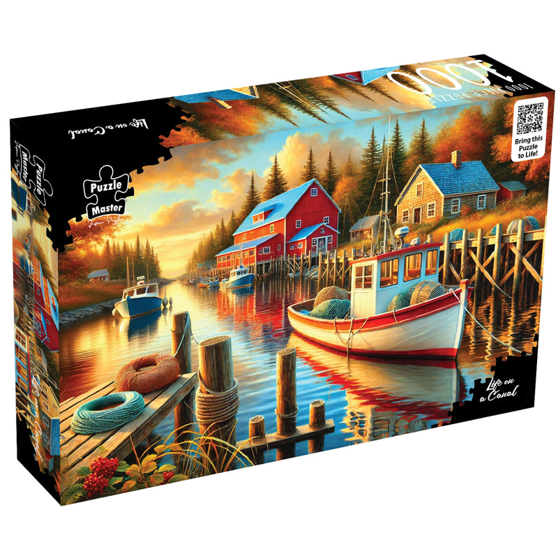 将图像加载到画廊查看器中，Puzzle Master Life on a Canal 1000-piece jigsaw puzzle box showing a colourful harbour scene at sunset.
